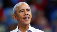 Former US President Barack Obama speaks at a campaign rally with Minnesota Governor and Democratic vice presidential candidate Tim Walz in support of Vice President and Democratic presidential candidate Kamala Harris at Alliant Center in Madison, Wisconsin, on October 22, 2024. (Photo by KAMIL KRZACZYNSKI / AFP) (Photo by KAMIL KRZACZYNSKI/AFP via Getty Images)