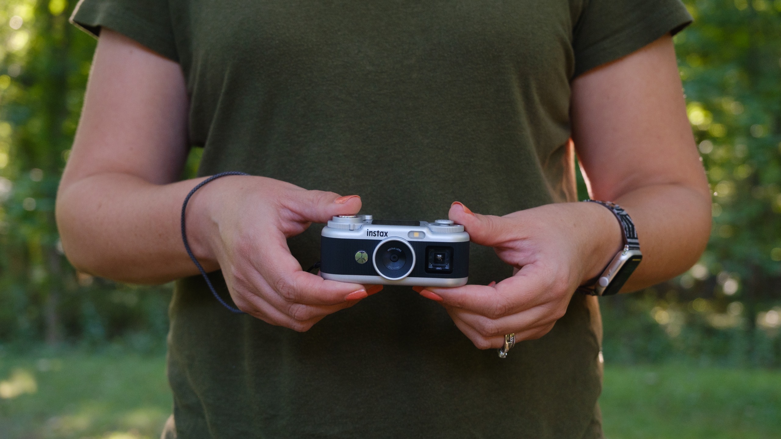 The Instax Pal 2 in a photographer's hands