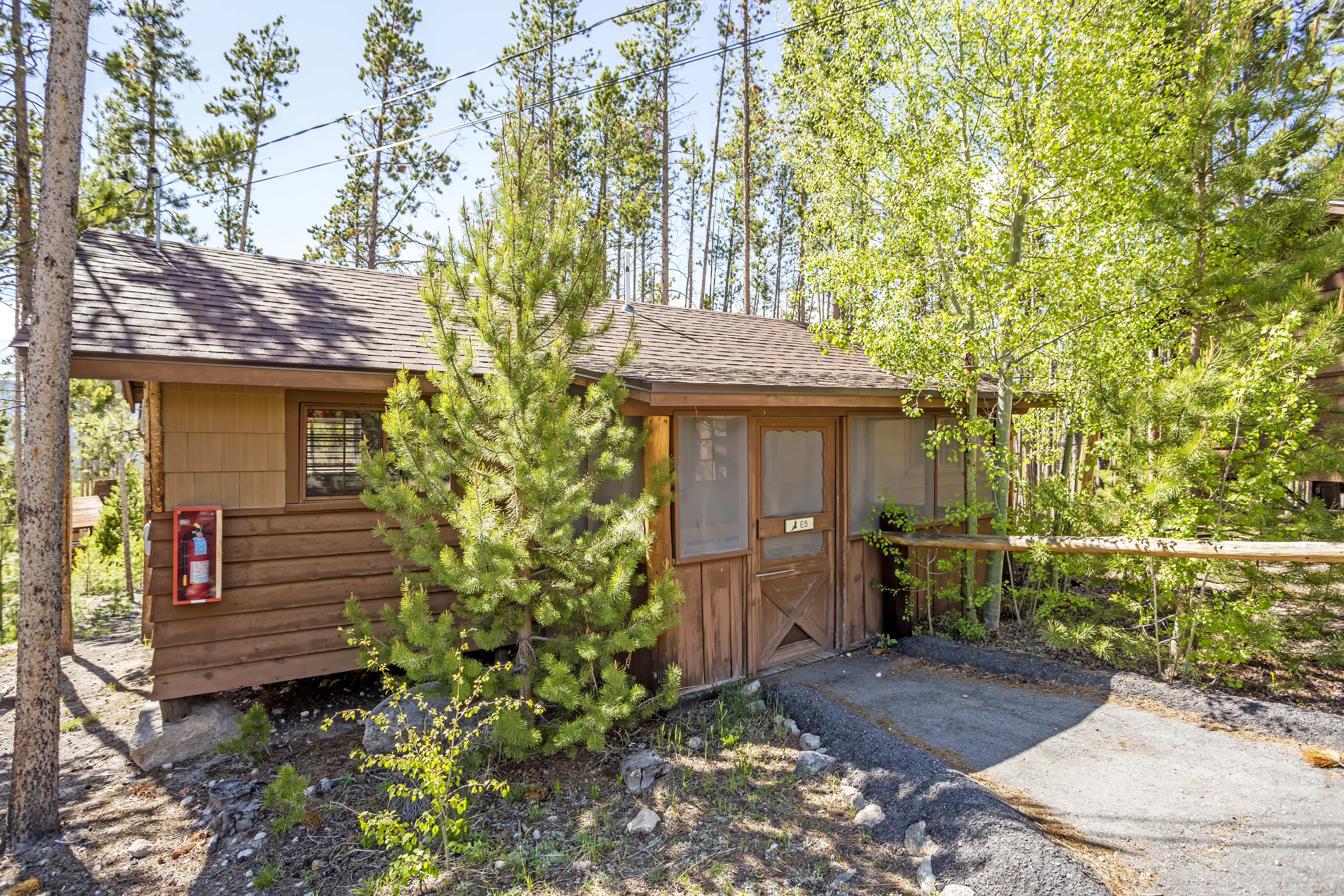 The wooden exterior of a cabin at Grand Lake Lodge