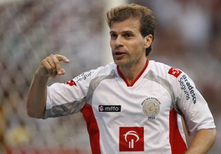 Tulio Maravilha celebrates after scoring in a charity match in Brazil, 2010