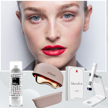 A woman with pale skin and a red lip wearing an updo. She is next to three beauty products and tools. 