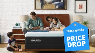 A family sit and chat on the Tempur-Pedic Breeze mattress