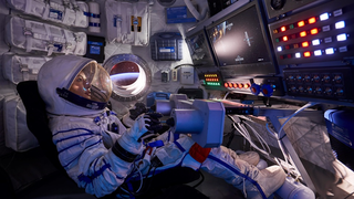 An guest dressed as an astronaut flies a space shuttle in an immersive sci-fi experience. 