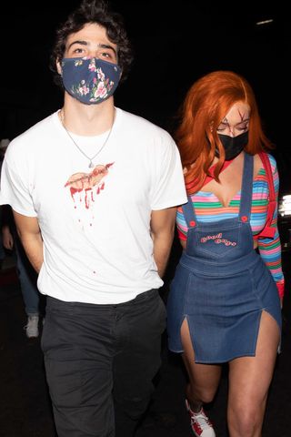 Stassie Karanikolaou & Noah Centineo seen Leaving Their Halloween Costume Party on October 30, 2020 in Los Angeles, California.