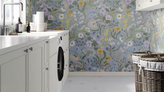 laundry room with pretty wallpaper