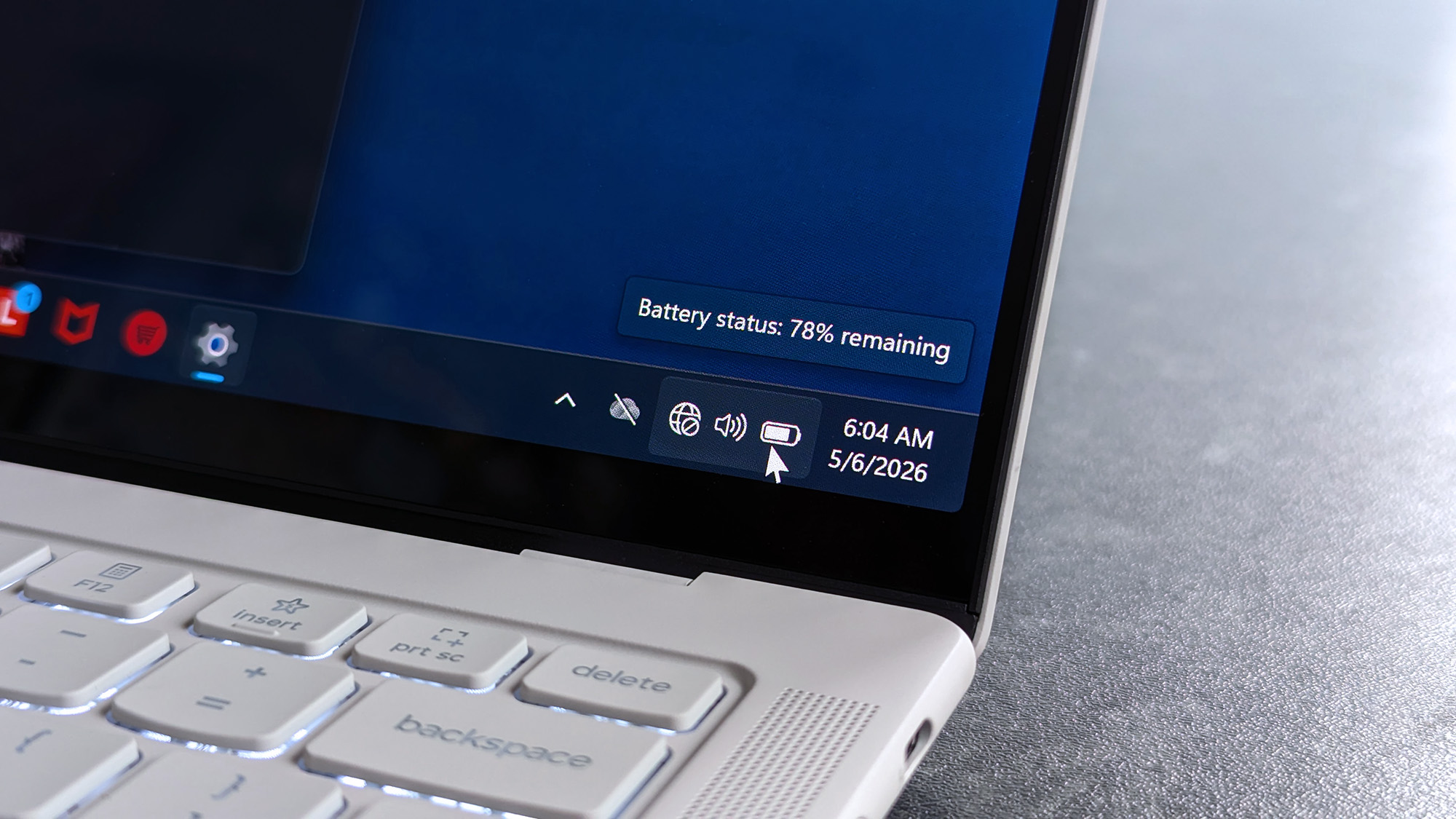 A close-up of a Lenovo Yoga Slim 7i Ultra (Gen 11) Aura Edition laptop screen showing a battery status of 78%. The taskbar displays a time of 6:04 AM and date as 5/6/2026, with visible keyboard keys.