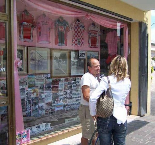 A store owner is interviewed by local television