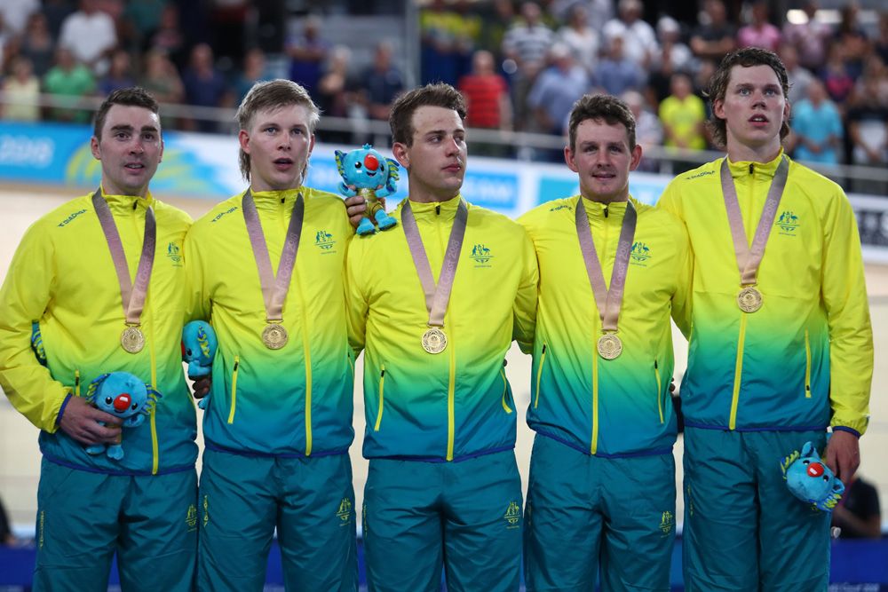 The Australian men collect their medals
