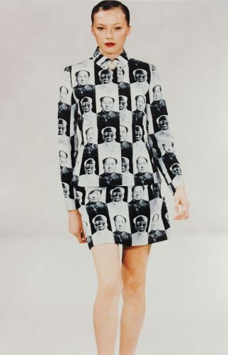 A model wearing a dress with Chairman Mao printed on