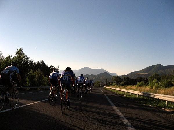 The peloton heads into the mountains.