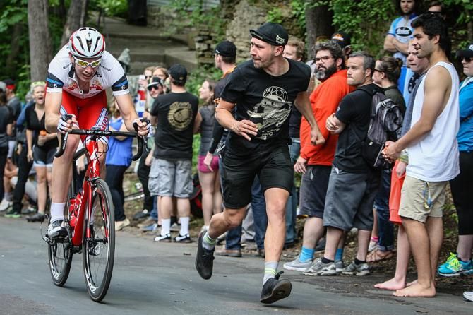 Ben Wolfe (California Giant) gets motivation from a fan on the climb