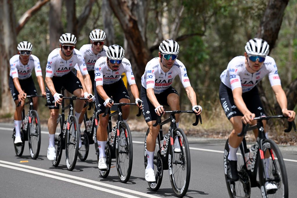 UAE Team Emirates massed together in the field