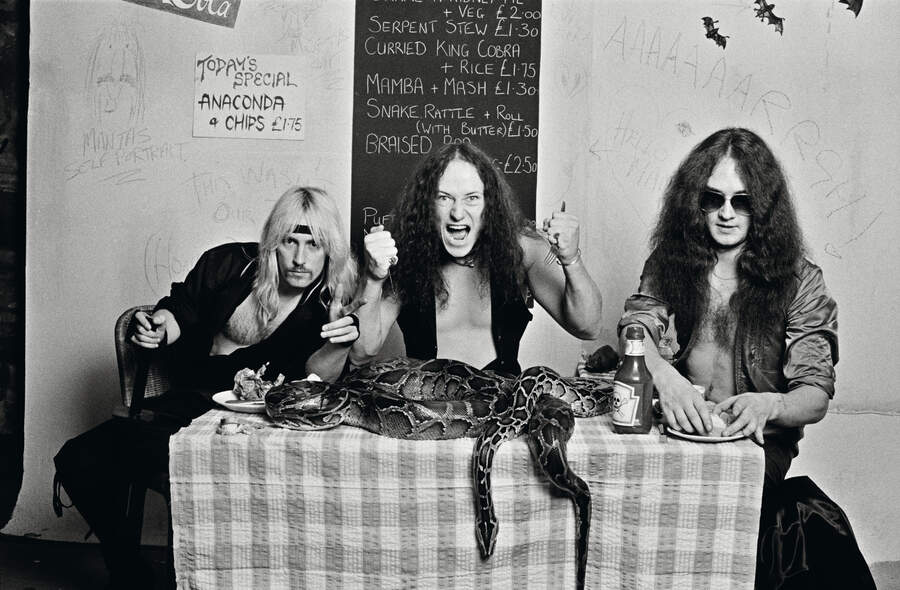 Venom in 1985, pretending to eat a plate of snakes