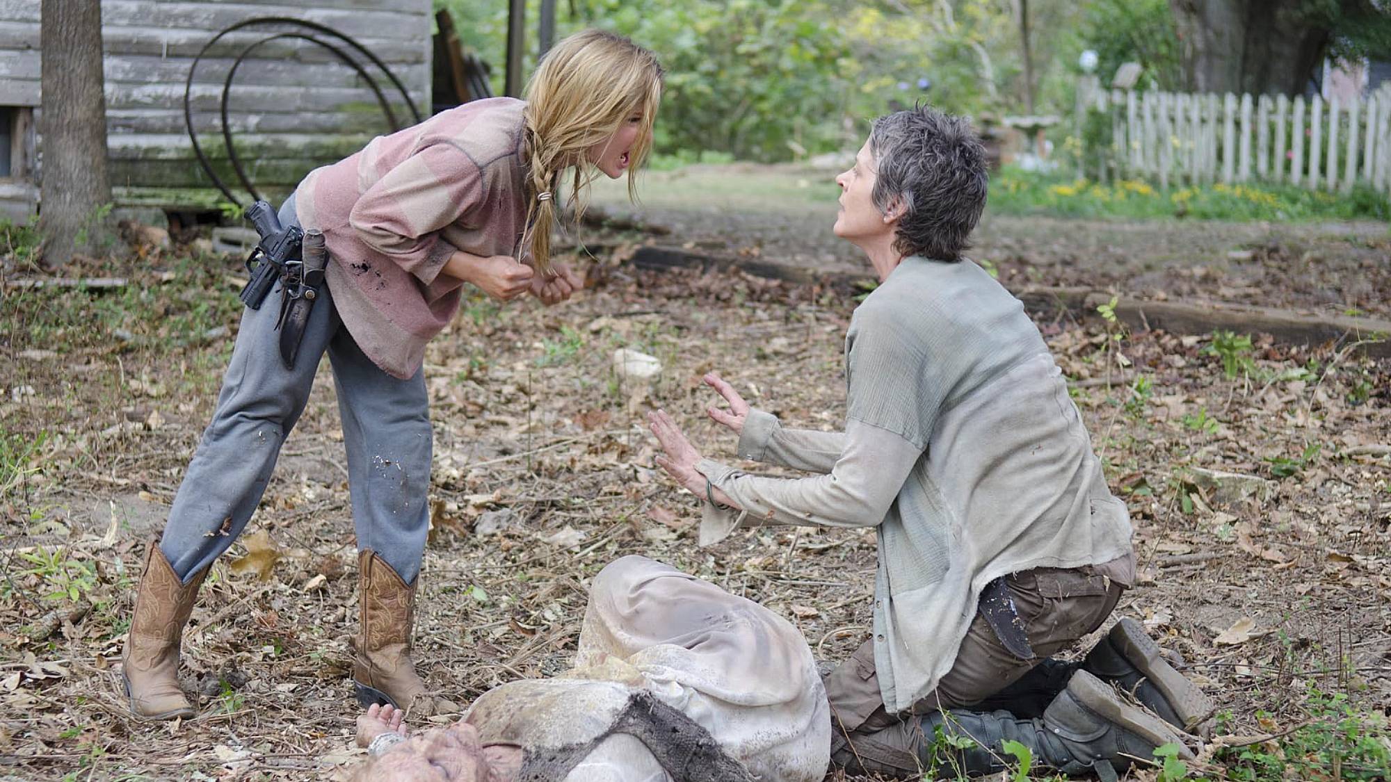 Brighton Sharbino as Lizzie shouting at Melissa McBride as Carol in "The Walking Dead" season 4 episode 14, titled "The Grove"