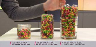 Jars of Skittles demonstrates the amount of pixels for video resolution in AVoIP.