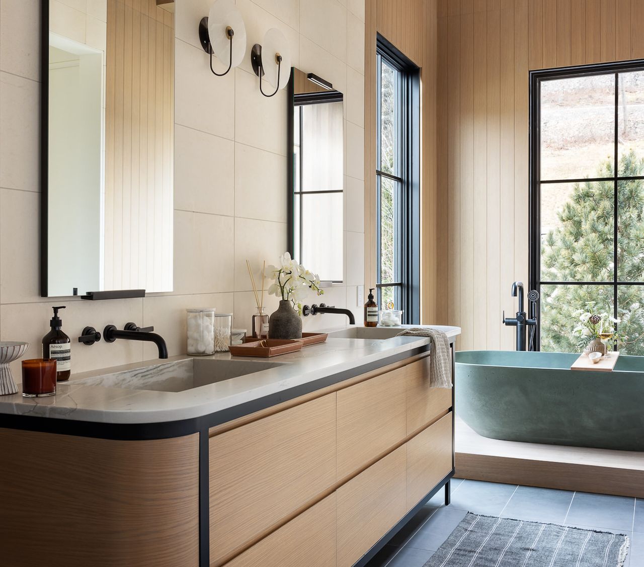 A neutral bathroom with freestanding tub