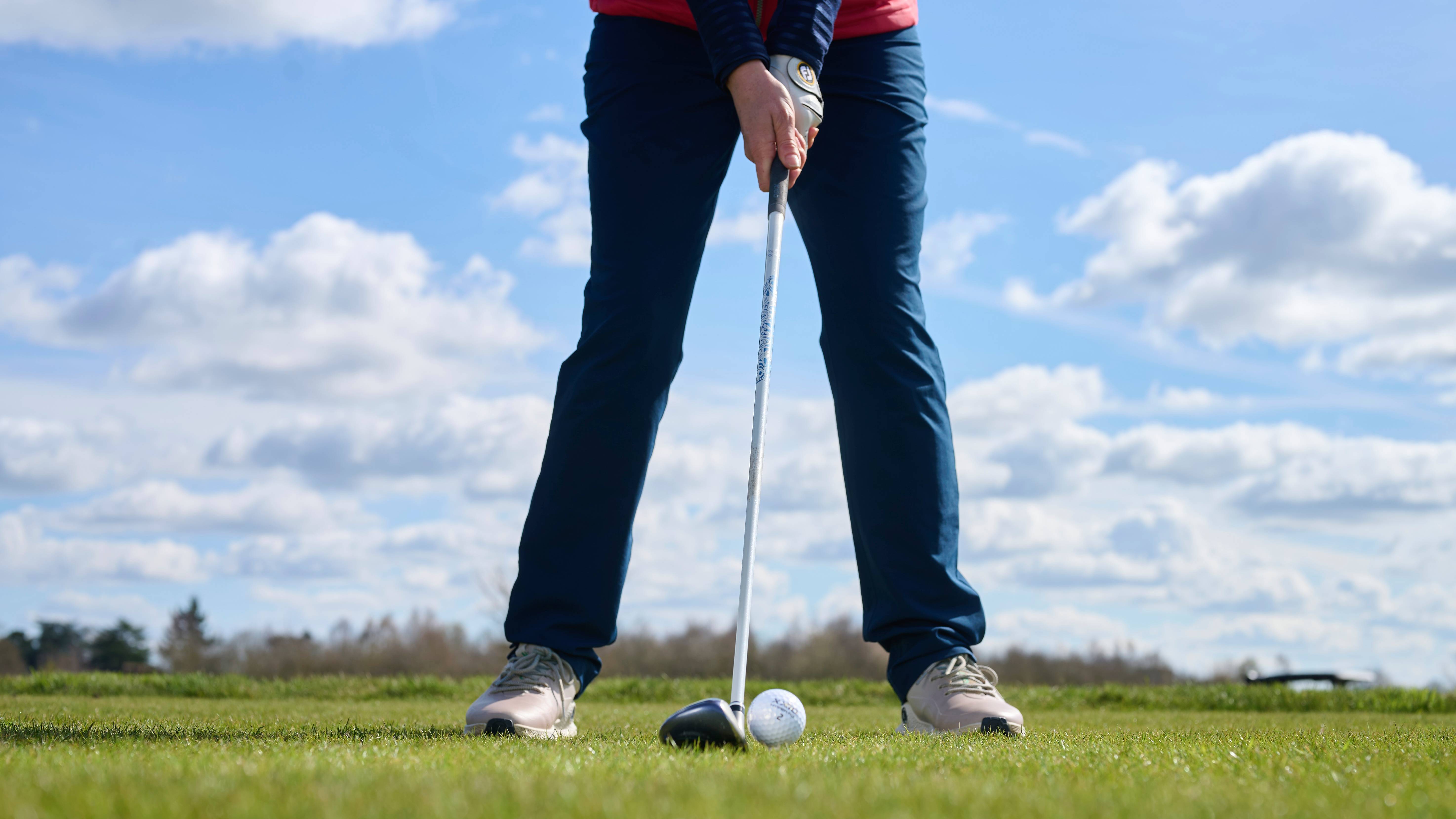 Correct ball position for a hybrid off the tee