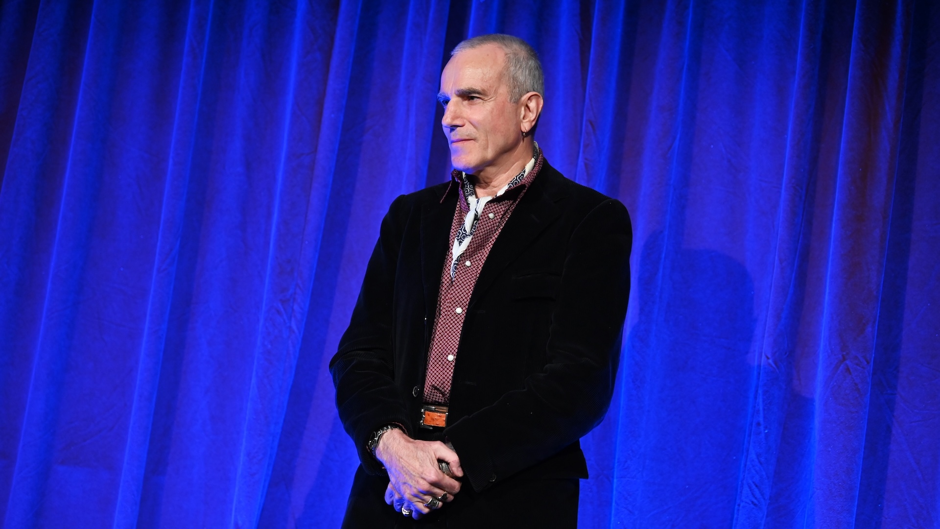 Daniel Day-Lewis standing on a stage 