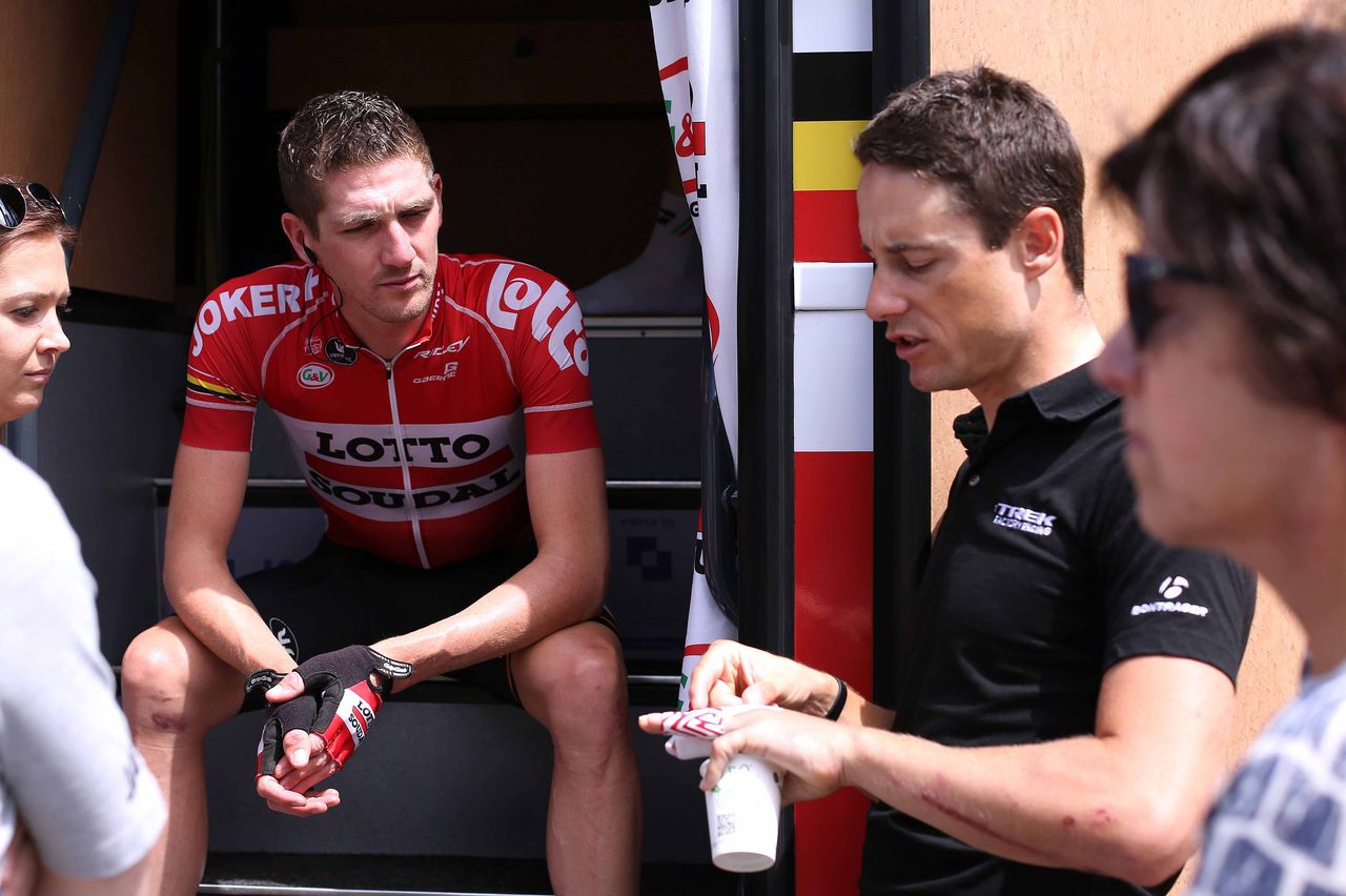 Jurgen Van den Broeck listens to Kristof Vandewalle explain how badly broken his finger is