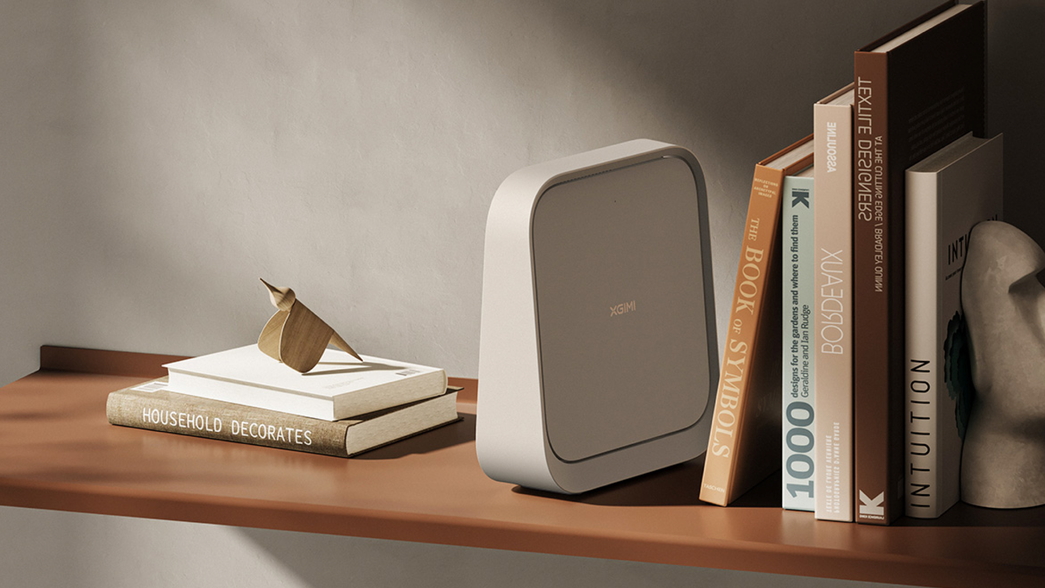 Lifestyle shot of the Xgimi Z6X 5th Generation projector folded up and sat on a bookshelf with books on either side