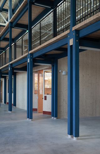 inside Magasin Electrique with blue columns