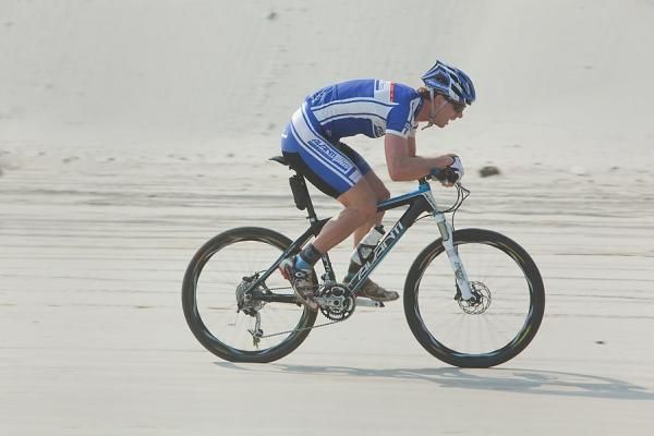 Ben Mather gives it everything on the beach.