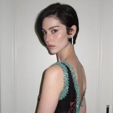 Gracie Abrams with a tucked pixie hairstyle