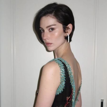 Gracie Abrams with a tucked pixie hairstyle