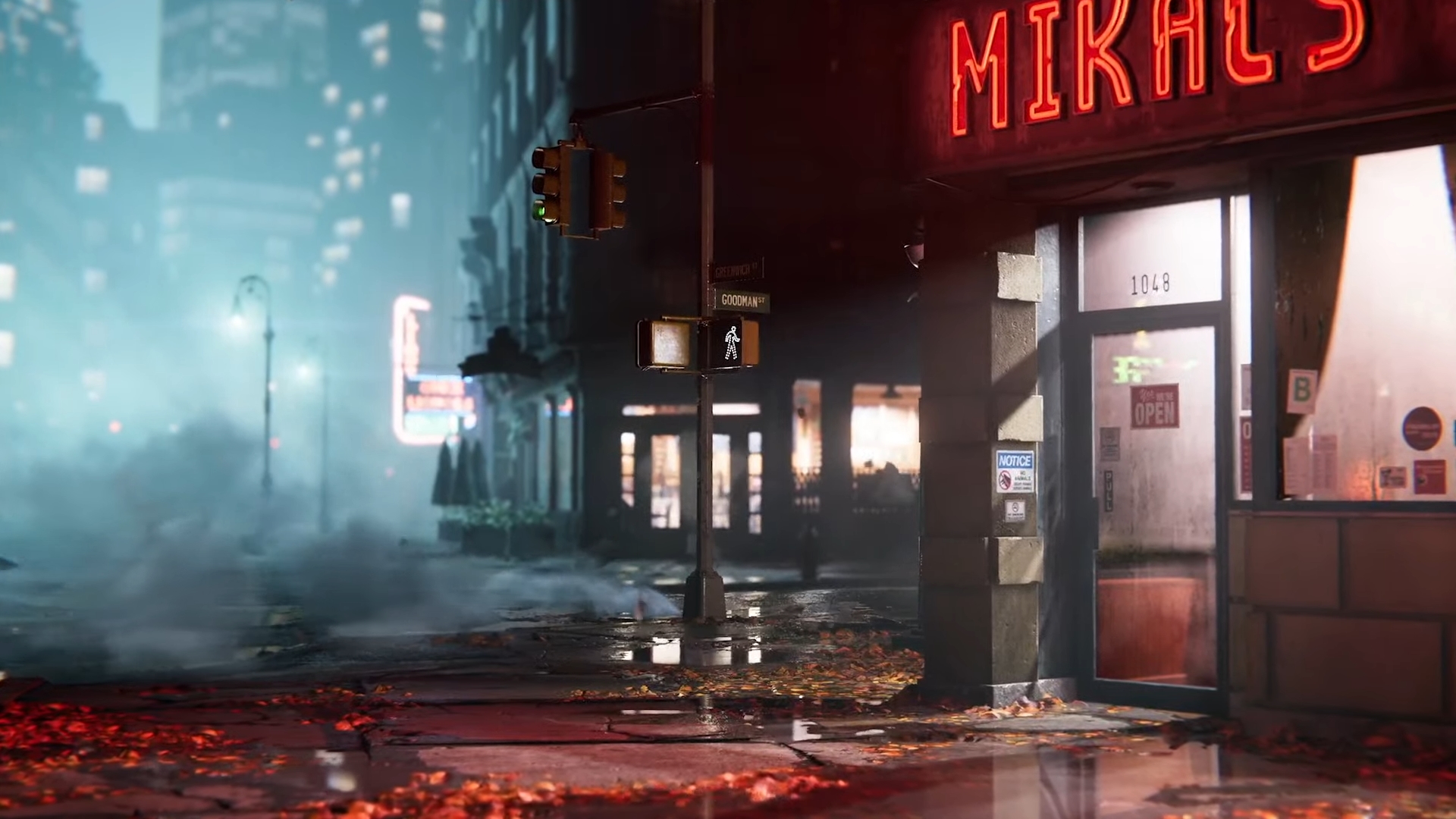 Screenshot from Marvel's Spider-Man 2 trailer showing a New York City street corner at night, lit up by streetlights and lights from inside buildings
