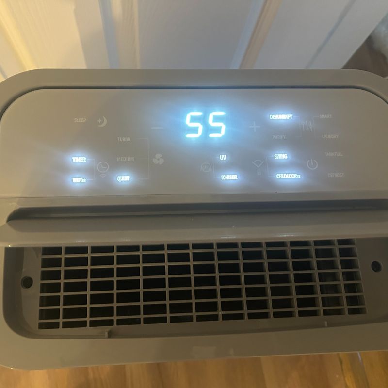 ElectricQ dehumidifier control panel, lit up with no 55 on display