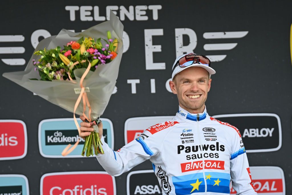 Belgian Eli Iserbyt celebrates on the podium after winning the men elite race of the Cyclocross Ruddervoorde the second stage of the Superprestige cyclocross cycling competition Saturday 23 October 2021 in Ruddervoorde Oostkamp BELGA PHOTO DAVID STOCKMAN Photo by DAVID STOCKMANBELGA MAGAFP via Getty Images