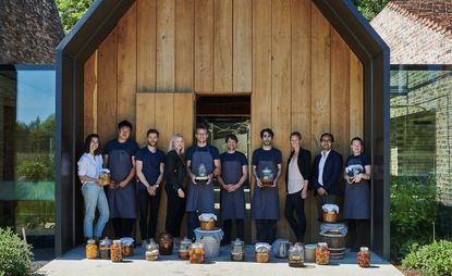 The Noma fermation team with Noma Project's new smoked mushroom garum.