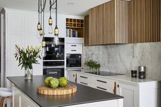 wood kitchen with ribbed wood cooker hood