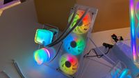 A prototype AIO cooler from Hyte that has RGB and a transparent fan shroud.