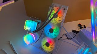 A prototype AIO cooler from Hyte that has RGB and a transparent fan shroud.