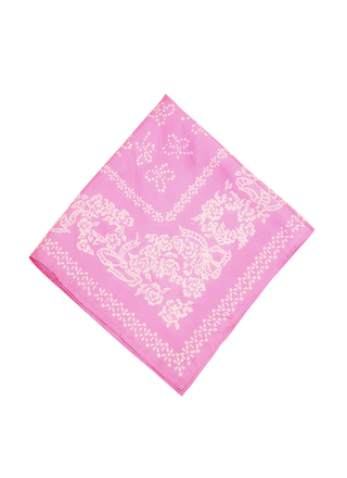 a pink bandana in front of a plain backdrop