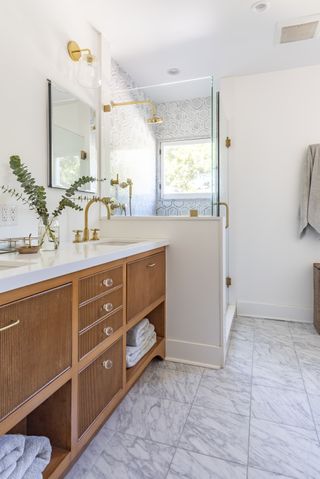 A bathroom with shaker cabinets