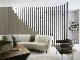 A minimalist curved white sofa