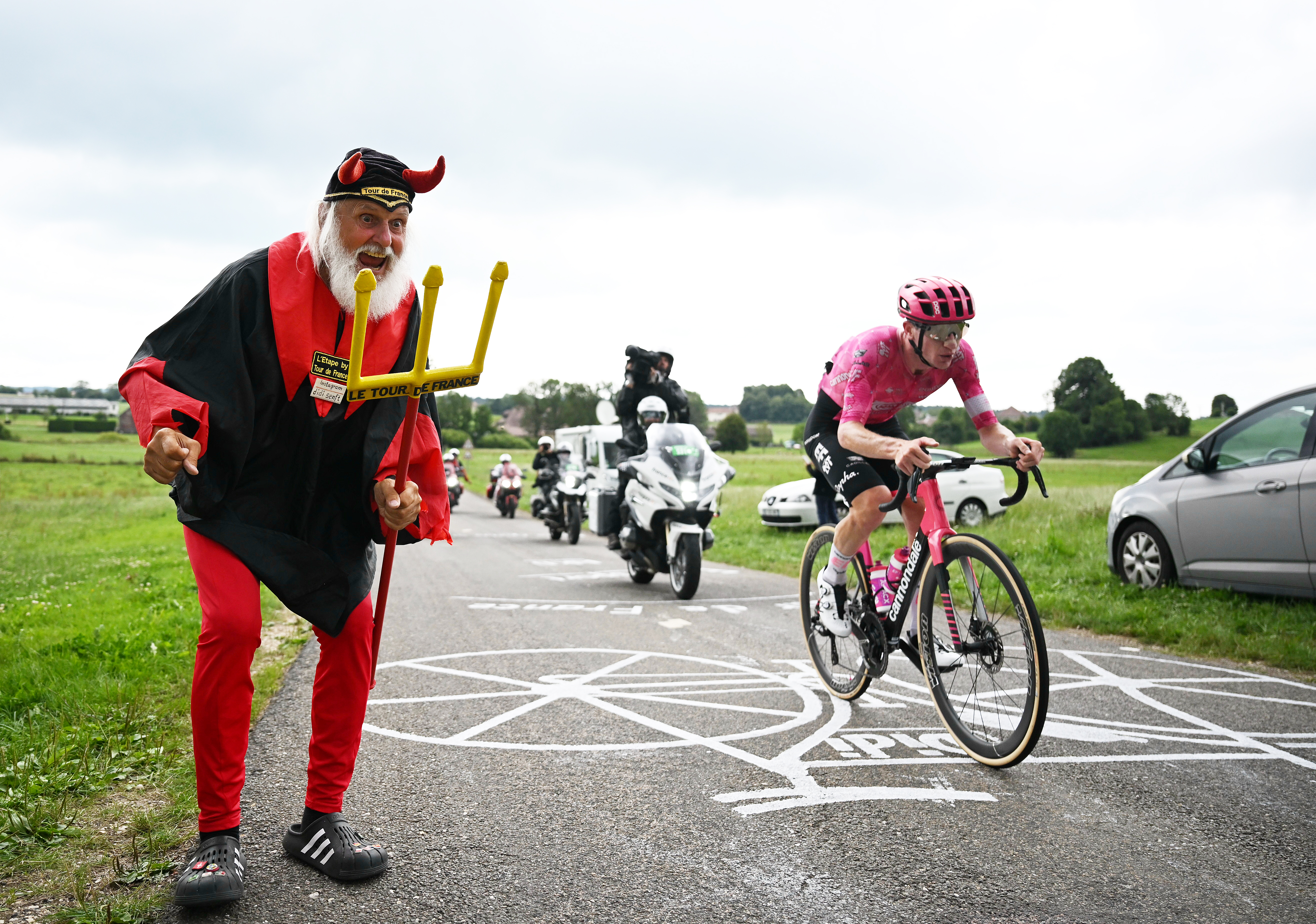 PONTARLIER, FRANCE - JULY 26: Didi Senft of Germany (Devil - Didi Devil) cheers to Harry Sweeny of Australia and Team EF Education - EasyPost in the breakaway during the 112th Tour de France 2025, Stage 20 a 184.2km stage from Nantua to Pontarlier / #UCIWT / on July 26, 2025 in Pontarlier, France. (Photo by Tim de Waele/Getty Images)