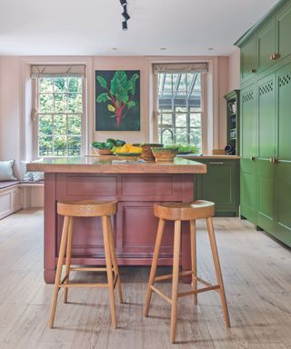 Pink and green kitchen with island