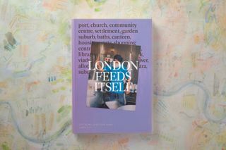 Front cover image of the book 'London feeds itself' purple background, black and white font, photograph image of a chef at work, watercolour sketch back drop