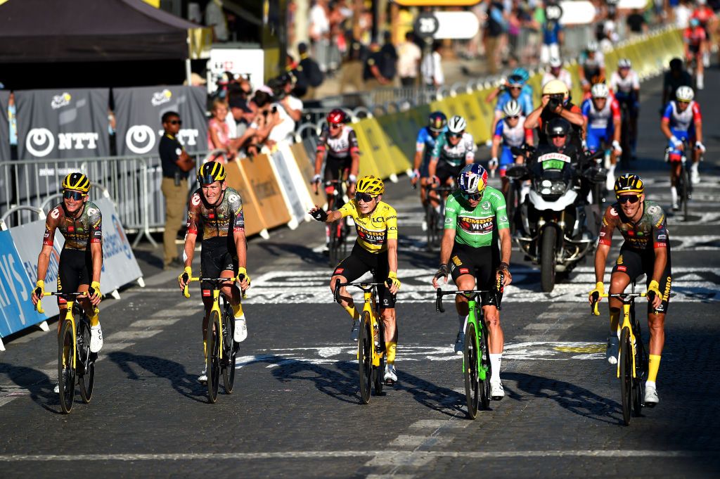 PARIS FRANCE JULY 24 LR Sepp Kuss of United States Tiesj Benoot of Belgium Jonas Vingegaard Rasmussen of Denmark Yellow Leader Jersey Wout Van Aert of Belgium and Green Points Jersey and Christophe Laporte of France and Team Jumbo Visma celebrate winning the 109th Tour de France 2022 Stage 21 a 1156km stage from Paris La Dfense to Paris Champslyses TDF2022 WorldTour on July 24 2022 in Paris France Photo by Dario BelingheriGetty Images