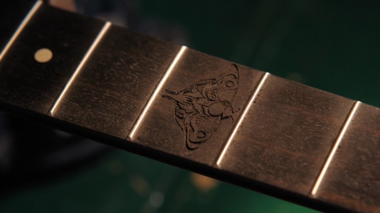 Moth etched into Ellie's guitar on The Last of Us Season 2.