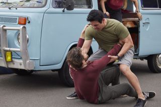 Justin Morgan (James Stewart) attacks a surfer