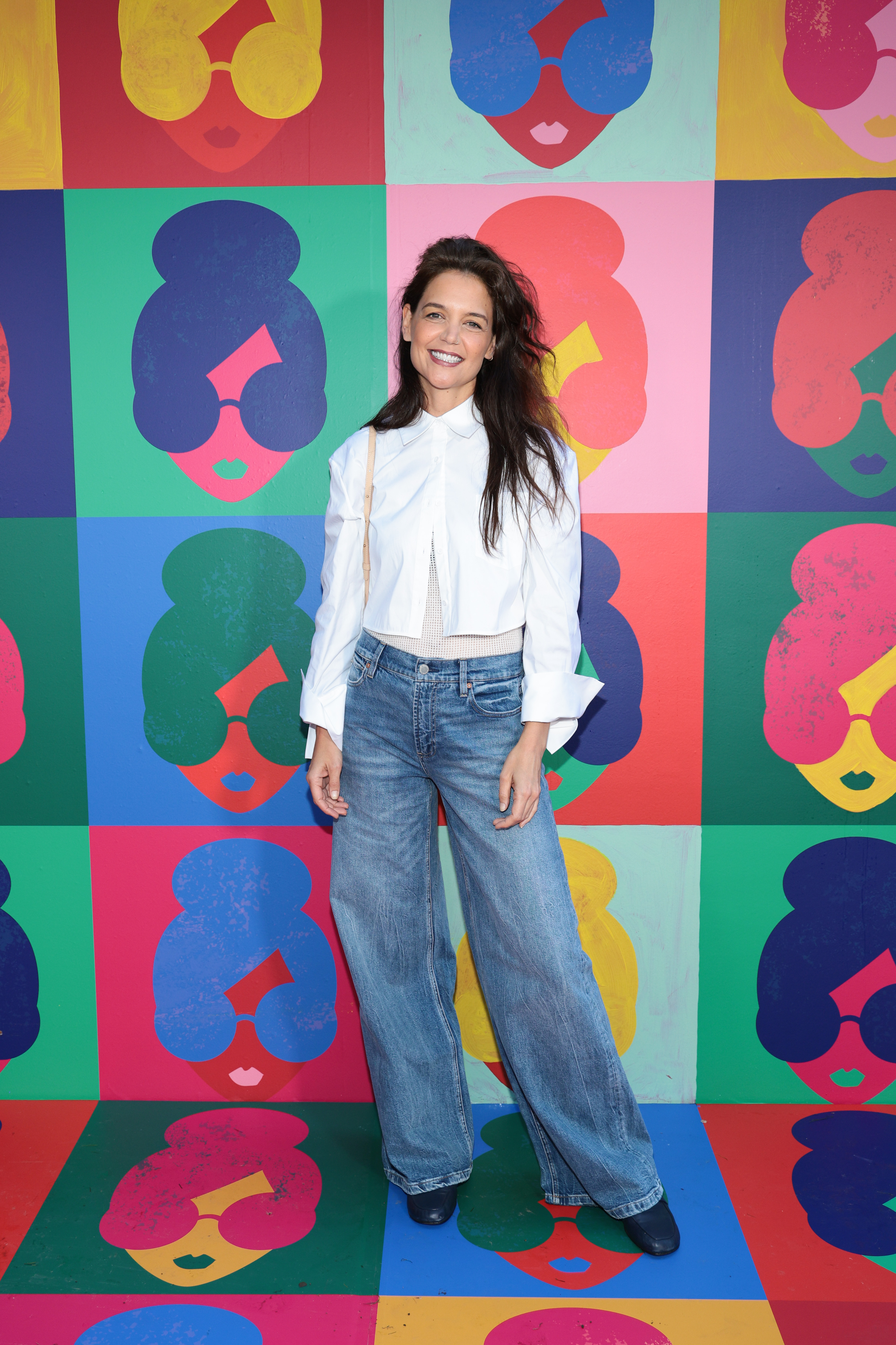 Katie Holmes wore a white button-down with jeans in 2023