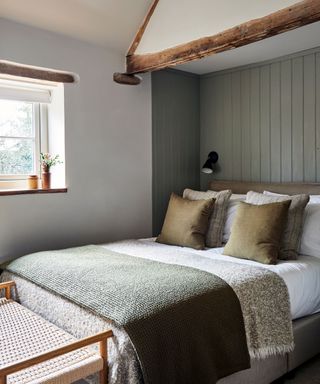 green country bedroom with tongue and groove and beams