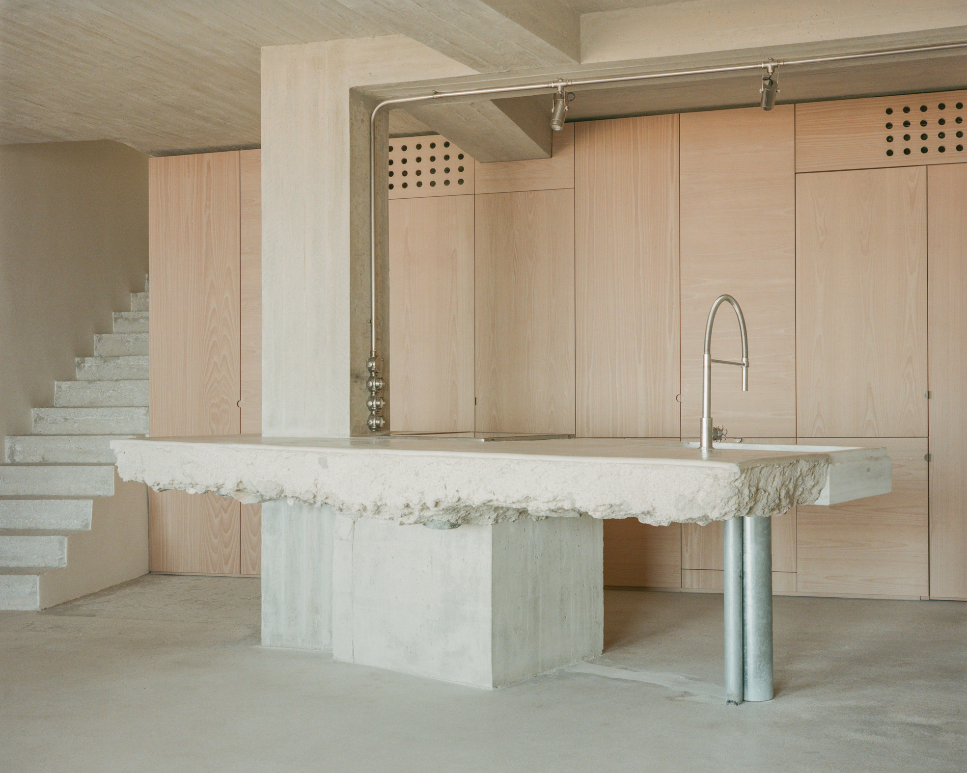 view of a Tinos house, using local vernacular such as stone walls and contemporary design