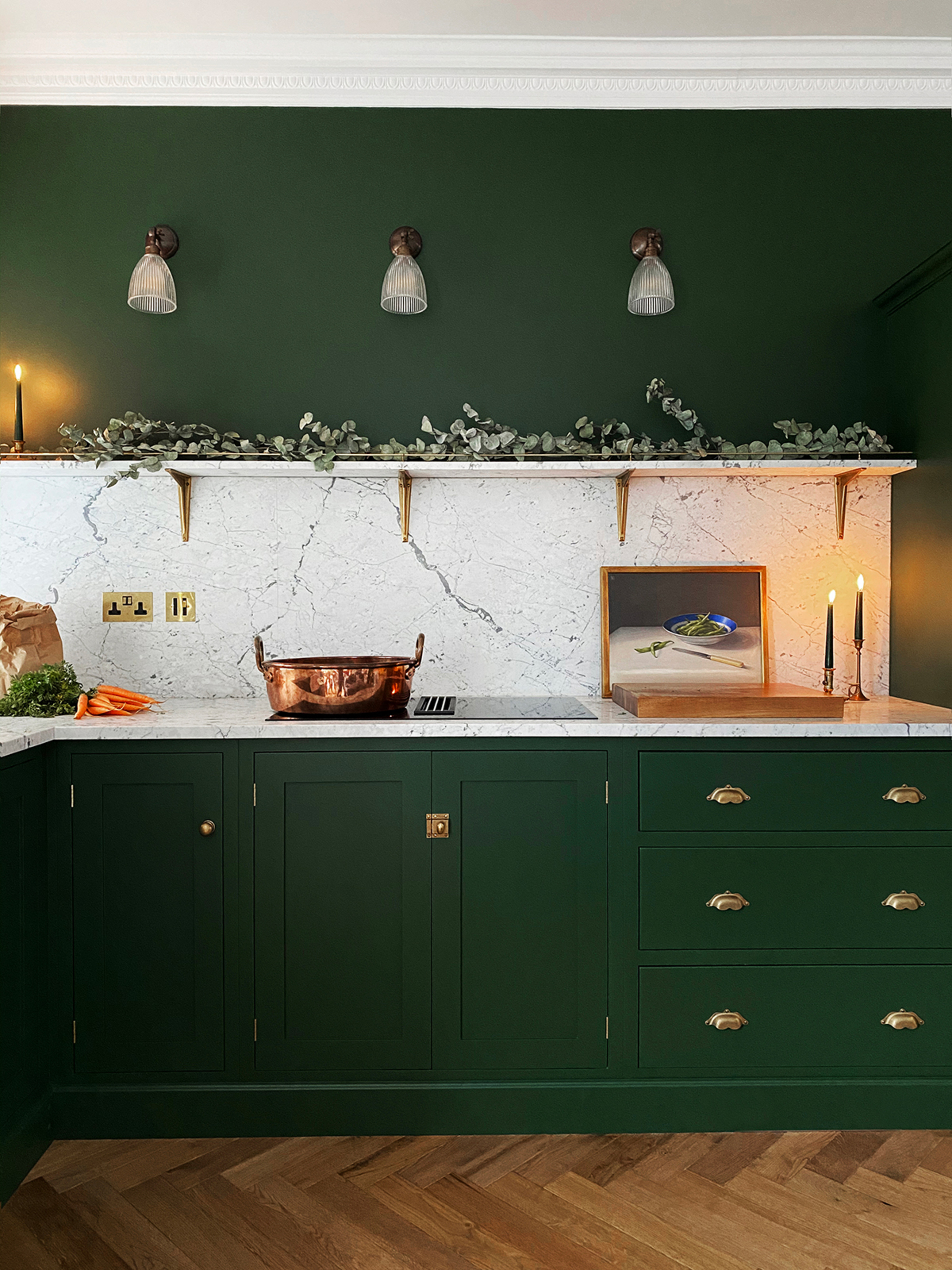 Olive green pairs well with marble in this deVOL kitchen