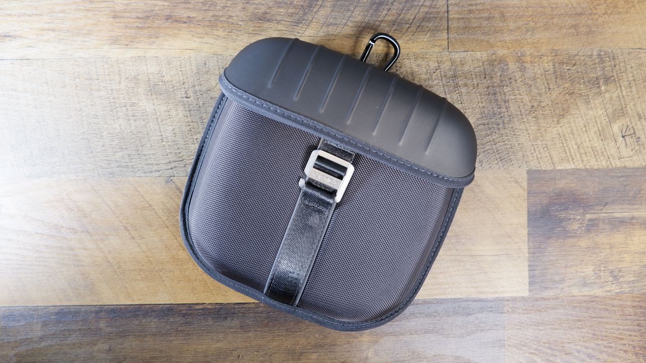 Raptic Smartform Case for AirPods Max closed on a wooden floor