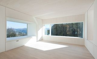 Inside Sunlighthouse: Picture windows frame the impressive views on the top floor